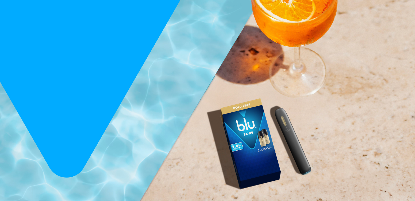 Blu pods on sandy beach with a drink